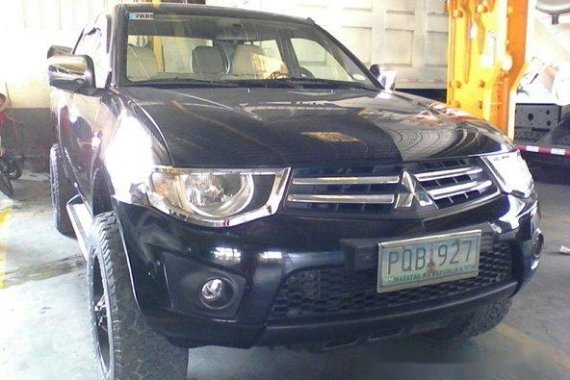 Mitsubishi Strada 2011 truckl black manual for sale 