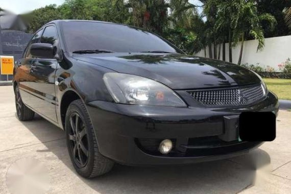 up for grabs very fresh mitsubishi lancer gls 2012 1st own cebu plate