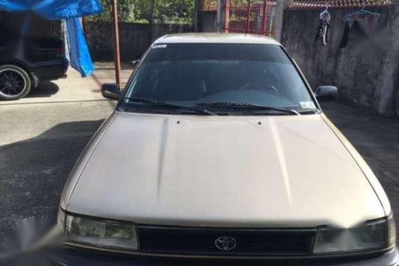 1992 toyota corolla golden brown and mistsubishi galant charcoalblack