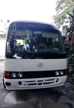 2011 toyota coaster 29seater 1HZ engine 6cylinder 95K mileage 1.3M