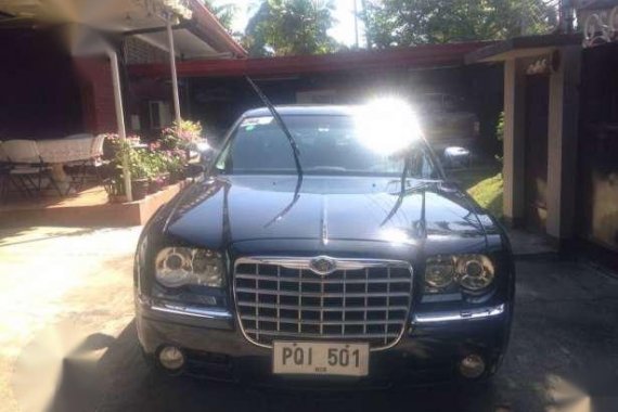 Chrysler 300C and Fortuner 2.7G