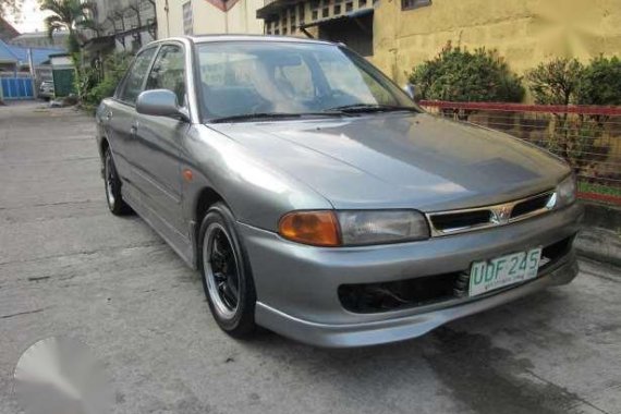 Mitsubishi lancer pormado 95 manual