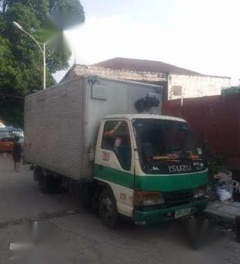 Isuzu Elf NKR Giga 4HF1 6W 14ft aluminum closevan.