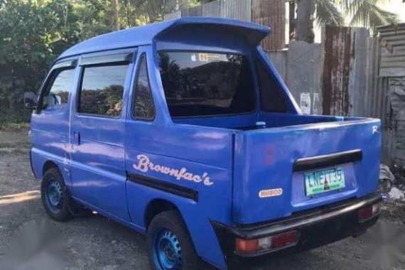 Blue Suzuki Multicab