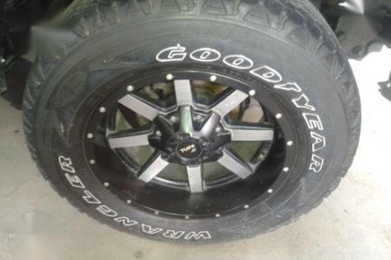 Isuzu Fuego 4x4 MT 2003 Red For Sale