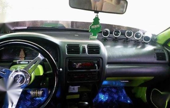 Mazda 323 Model 1998 Green for sale