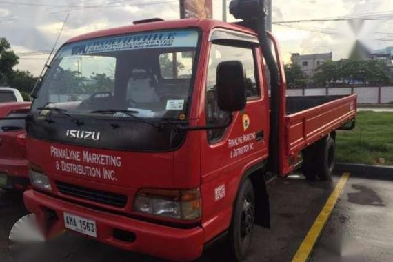  Isuzu Elf Dropside Giga 4hg114ft wide NPR for sale