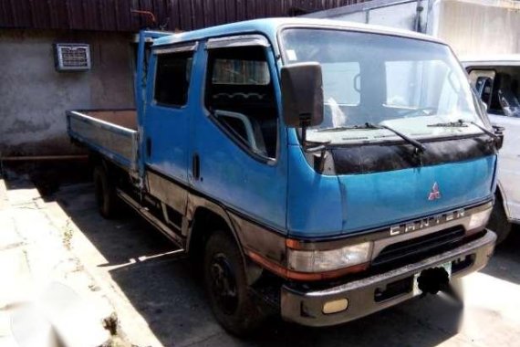 Canter Dropside 4d33 double cab giga