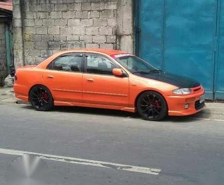 mazda 323 familia