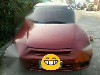 MAZDA 323 Model 1996 Red For Sale