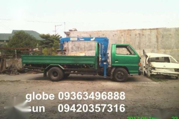 isuzu boom elf truck 2.5 toners and 10pd cargo 5 tons boom double diff