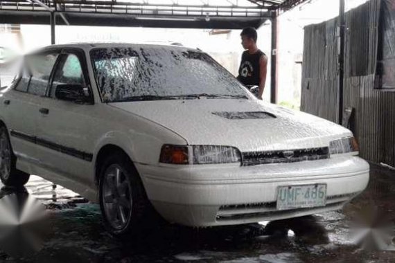 Mazda 323 1996 MT White For Sale