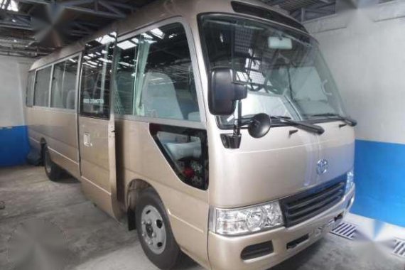 2013 Toyota Coaster Gliding Door Dubai Version (Beige)