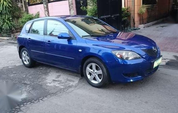 mazda3 05 AT all pwr 1.5 good on gas easy to drive shiny paint
