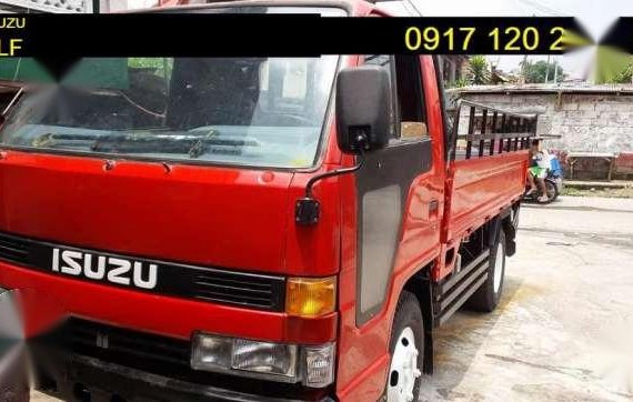 Isuzu Elf 10ft Dropside MT Red For Sale
