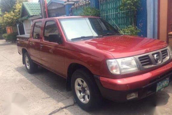 Nissan Frontier Bravado Pick Up Red MT