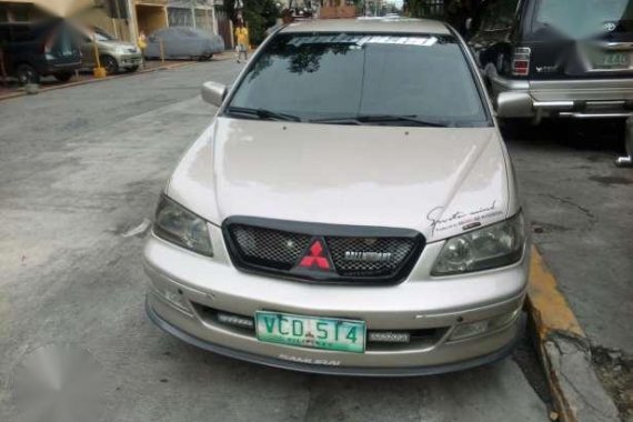 2004 mitsubishi lancer tag nissan mazda