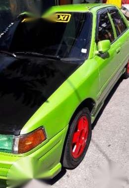 Mazda 323 Gen 1 Green MT For Sale