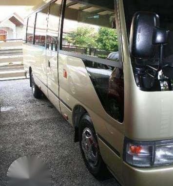 2004 LMTD. Toyota Coaster Diesel 40Tkm Manual - 2TvDvd USB REF