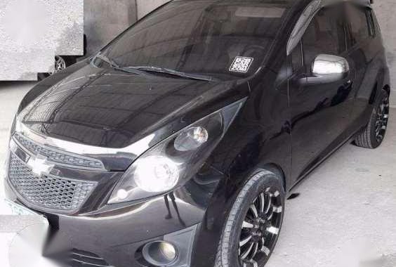 Chevrolet Spark 2012. Top of the Line. Automatic. Black. P328T