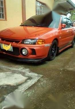 Mitsubishi Lancer 1996 MT Orange For Sale