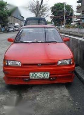 Mazda 323 1995 MT Red Fpr Sale