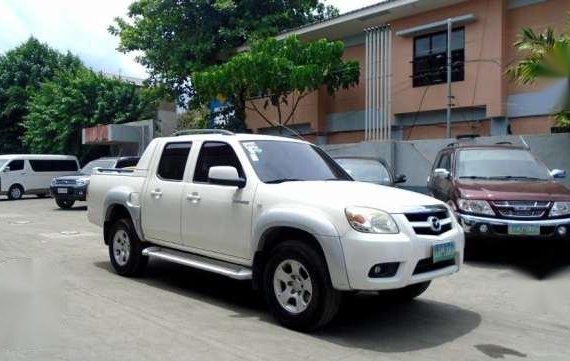 2009 Mazda BT-50 528t Nego (Kotsemar) vs Navara Strada