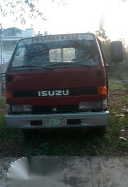 Isuzu Elf Dropside 1999 Red MT For Sale