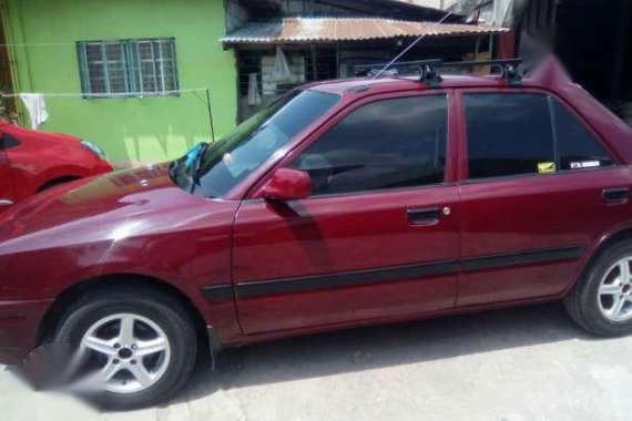 Mazda 323 97 model in good condition for sale