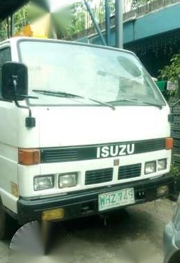Isuzu Elf Boom truck drop side