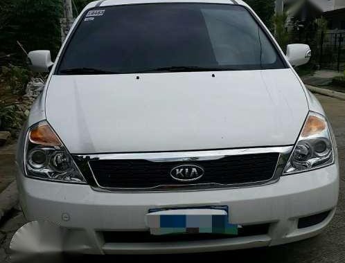 Kia Carnival 2013 2.9 MT White Van For Sale