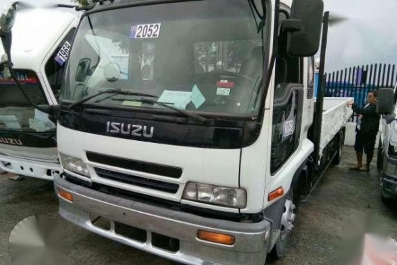 2016 Isuzu ELF Dropside 6HL 1 White MT Trucks 
