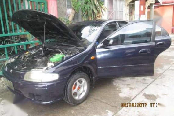 Mazda 323 1.4 1997 MT Blue Sedan For Sale