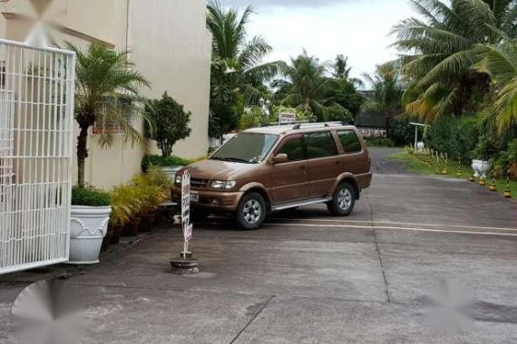 Isuzu XUVi Limited lifted with hitch