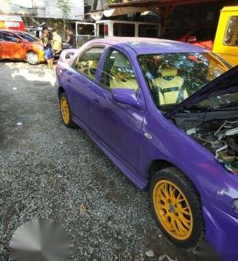 Mazda 323 1997 Sedan MT Purple For Sale