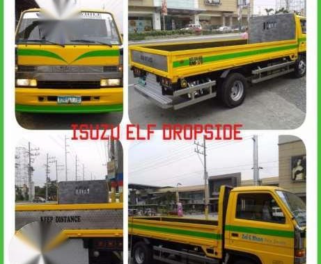 Isuzu elf dropside and isuzu elf close van