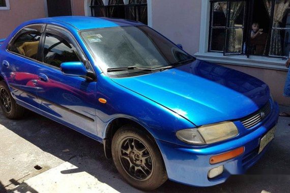 Mazda 323 1997 sedan blue for sale 