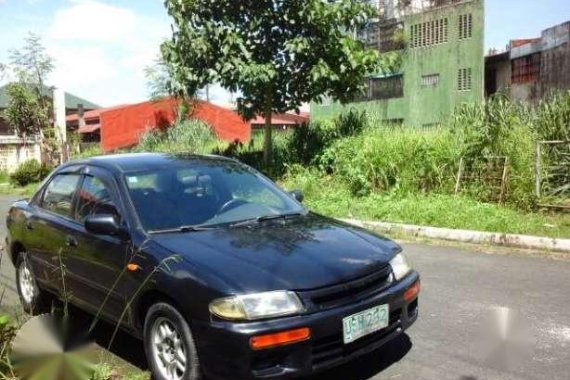 Mazda 323 Glxi Rayvan 1997 MT Black For Sale
