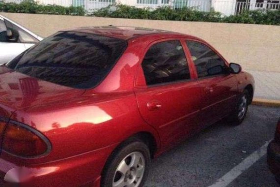 Mazda Sedan Gas red for sale 