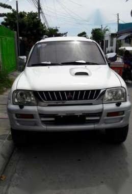 Strada Mitsubishi  truck silver for sale 