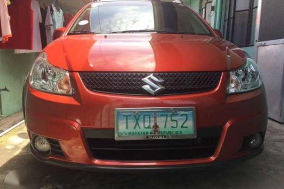 Suzuki sx4 2012 SUV orange for sale 