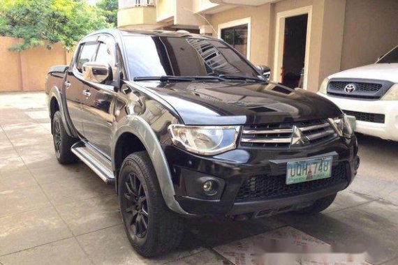 Mitsubishi Strada 2012 Black Diesel for sale
