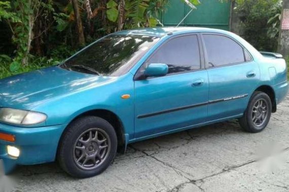 Mazda 323 familia glxi rayban