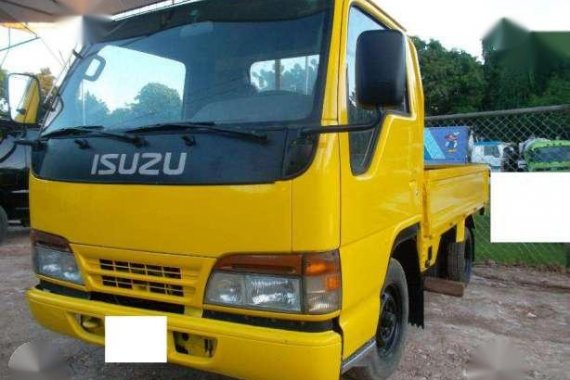 Isuzu Elf Dropside Cargo Truck and Toyota Ace Dropside