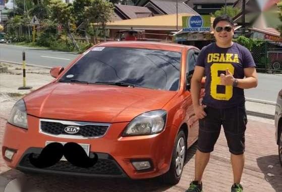 Kia Rio 2010 1.4 AT Sunset Orange