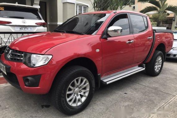 FOR SALE RED Mitsubishi Strada 2014