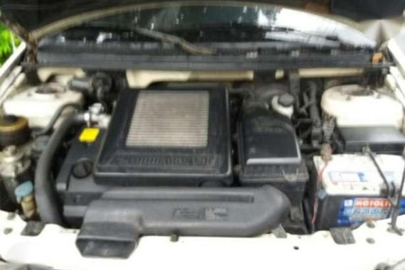 Kia Carnival 2000 AT White Van For Sale 