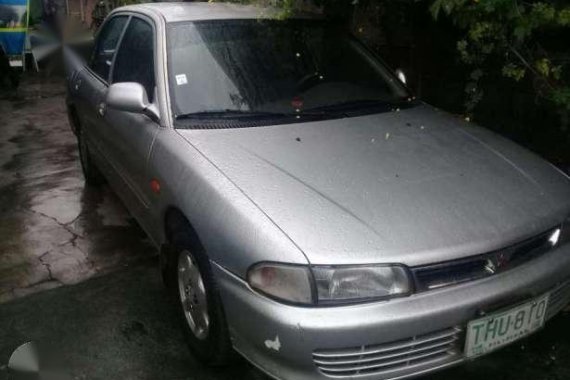 Mitsubishi GLXI sedan silver for sale 
