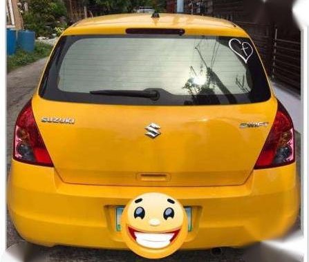 Suzuki Swift 2009 HB AT Yellow For Sale 