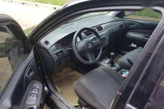 Mitsubishi Lancer rush sale! 215k.